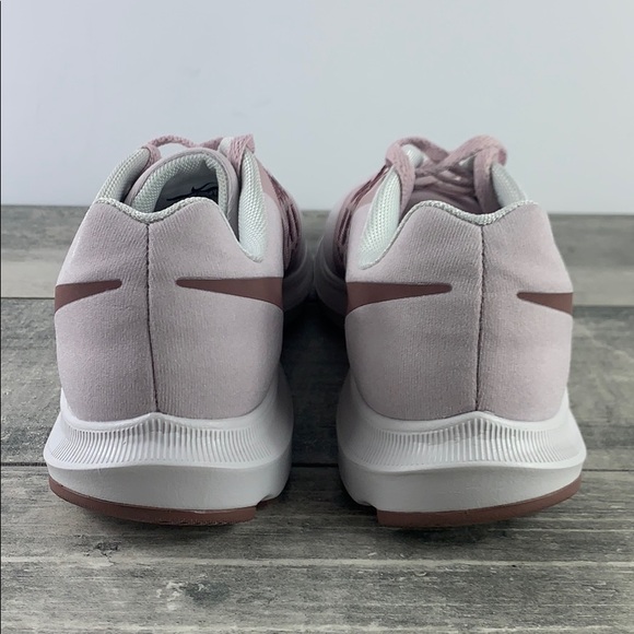 nike run swift pink